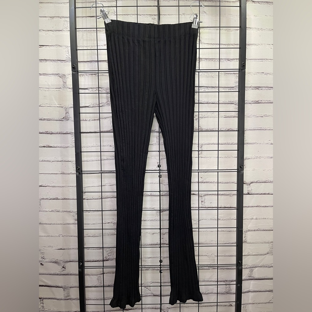 Reformation Black ribbed flare stretch pants (NEW) size medium